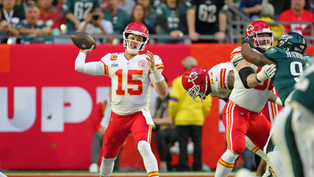 Feb 12, 2023; Glendale, Arizona, US; Kansas City Chiefs quarterback Patrick Mahomes (15) passes the ball against the Philadelphia Eagles during the first quarter of Super Bowl LVII at State Farm Stadium. Mandatory Credit: Kirby Lee-USA TODAY Sports